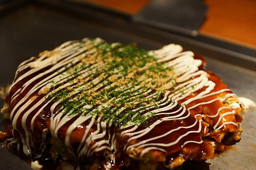Savoury pancake on a griddle